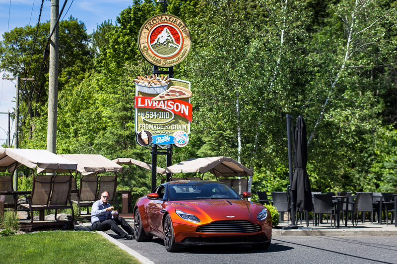 Illustration for article titled Chasing Canada's Greasiest People's Food In A $200,000 Aston Martin